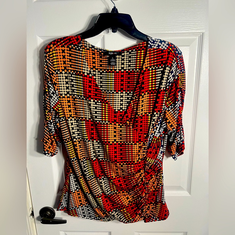 Ladies multi color cross over blouse
